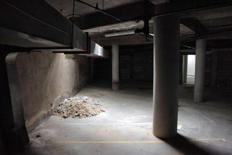 A stripped-out 60's City office building with fantastic rooftop views of St Paul's and The Shard, a very gritty basement and a large open air car park. Ideal for The Sweeney