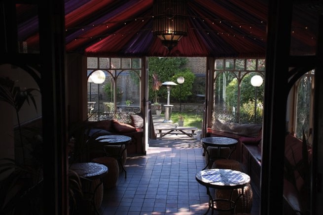 Pub with function room and expansive beer garden.