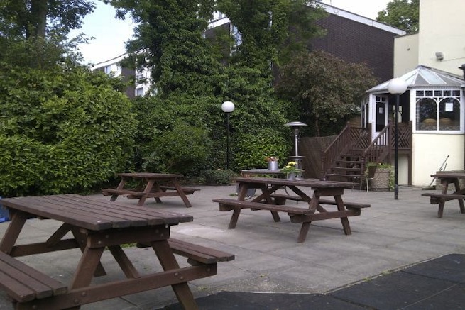 Pub with function room and expansive beer garden.