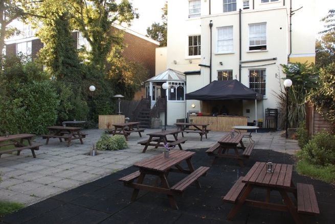 Pub with function room and expansive beer garden.