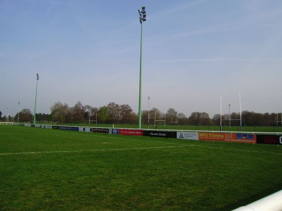 Sports Club with rugby pitches, clubhouse, turnstiles, canteen and members' bar.