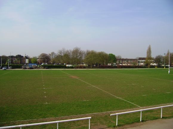 Sports Club with rugby pitches, clubhouse, turnstiles, canteen and members' bar.