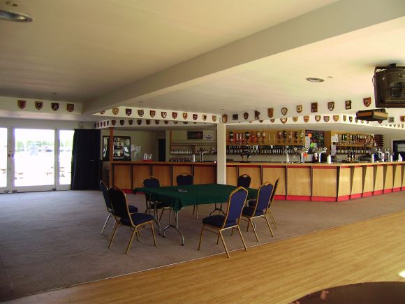 Sports Club with rugby pitches, clubhouse, turnstiles, canteen and members' bar.