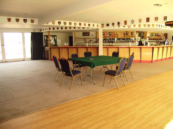 Sports Club with rugby pitches, clubhouse, turnstiles, canteen and members' bar.