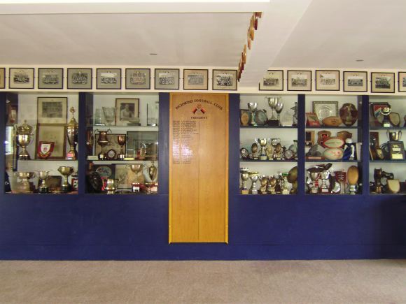 Sports Club with rugby pitches, clubhouse, turnstiles, canteen and members' bar.
