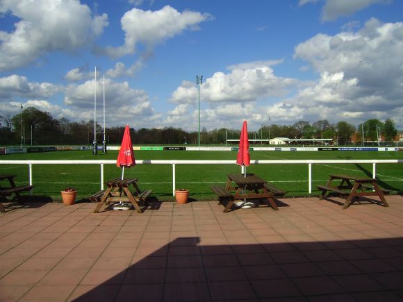 Sports Club with rugby pitches, clubhouse, turnstiles, canteen and members' bar.