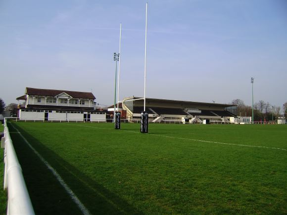 Sports Club with rugby pitches, clubhouse, turnstiles, canteen and members' bar.