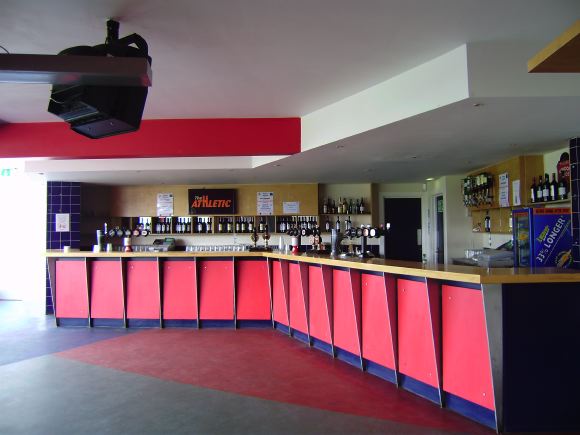 Sports Club with rugby pitches, clubhouse, turnstiles, canteen and members' bar.