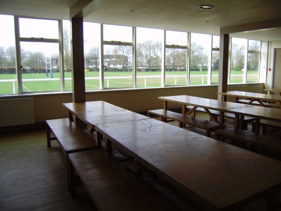 Sports Club with rugby pitches, clubhouse, turnstiles, canteen and members' bar.