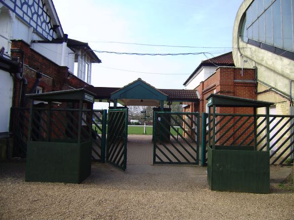 Sports Club with rugby pitches, clubhouse, turnstiles, canteen and members' bar.