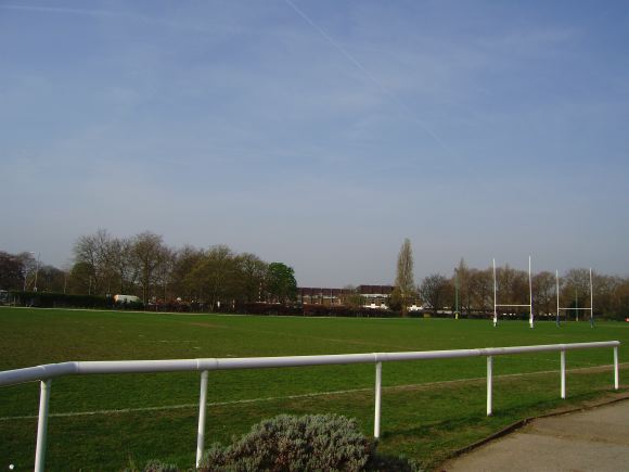 Sports Club with rugby pitches, clubhouse, turnstiles, canteen and members' bar.