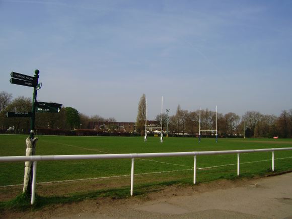 Sports Club with rugby pitches, clubhouse, turnstiles, canteen and members' bar.