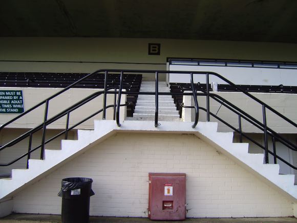 Sports Club with rugby pitches, clubhouse, turnstiles, canteen and members' bar.