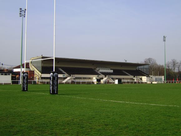 Sports Club with rugby pitches, clubhouse, turnstiles, canteen and members' bar.