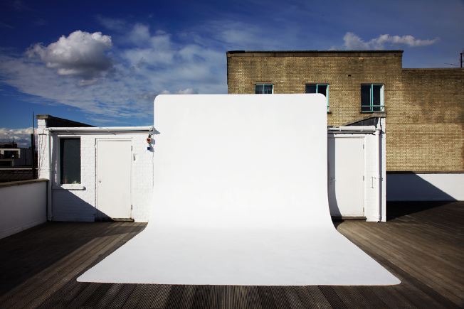 Decked roof terrace with infinity cove. Providing magnificent views across East London.