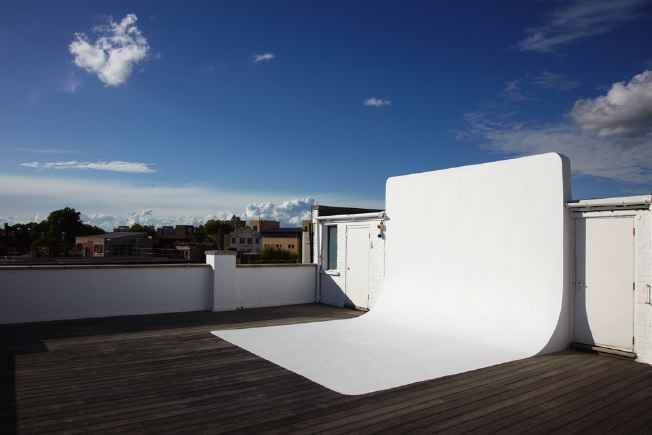 Decked roof terrace with infinity cove. Providing magnificent views across East London.