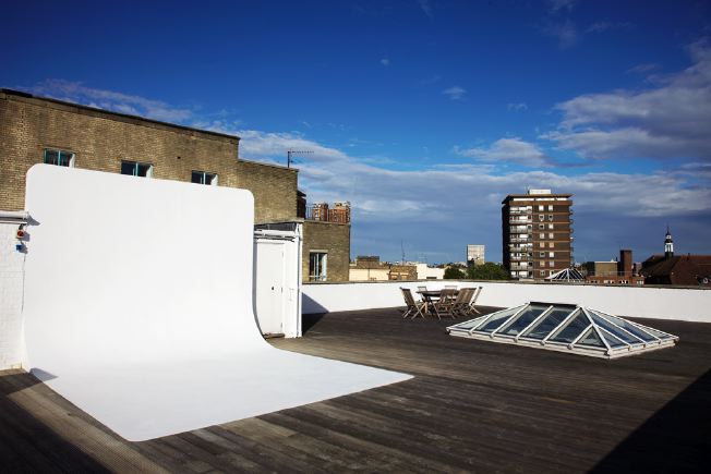 Decked roof terrace with infinity cove. Providing magnificent views across East London.