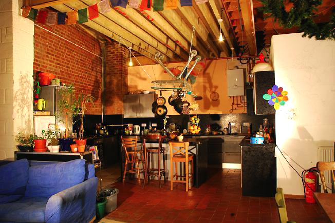 Bright, spacious 1,200 sq ft warehouse conversion with living area and studio space. The studio space is glass fronted with shutters and can be blacked out. NB- ceiling is now solid - no beams.