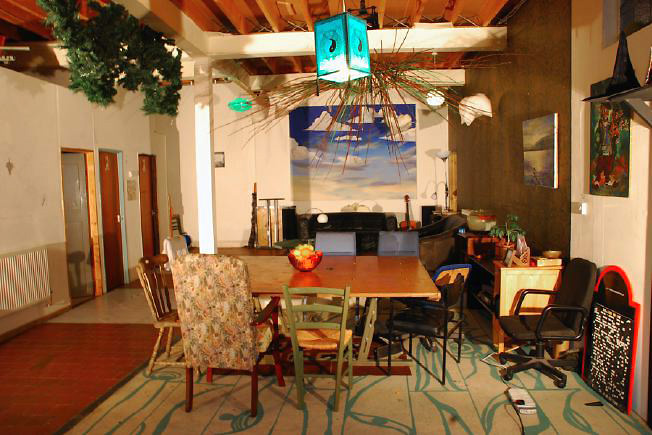 Bright, spacious 1,200 sq ft warehouse conversion with living area and studio space. The studio space is glass fronted with shutters and can be blacked out. NB- ceiling is now solid - no beams.