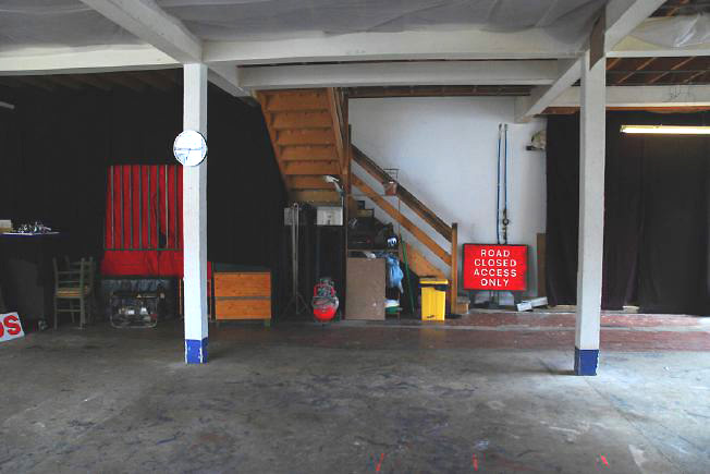 Bright, spacious 1,200 sq ft warehouse conversion with living area and studio space. The studio space is glass fronted with shutters and can be blacked out. NB- ceiling is now solid - no beams.