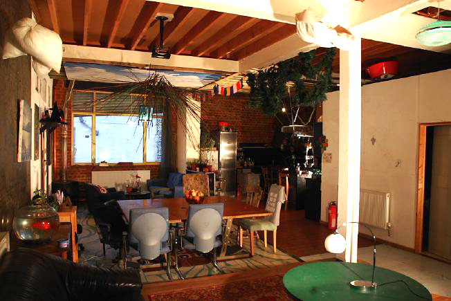 Bright, spacious 1,200 sq ft warehouse conversion with living area and studio space. The studio space is glass fronted with shutters and can be blacked out. NB- ceiling is now solid - no beams.