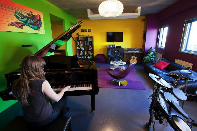 Very colourful, fun location with various rooms including a skate park, a recording studio and a games' room.