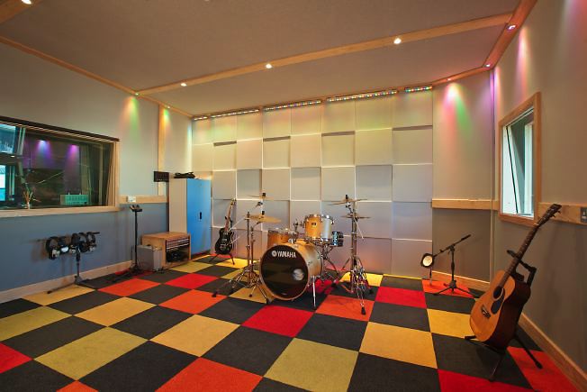 Very colourful, fun location with various rooms including a skate park, a recording studio and a games' room.