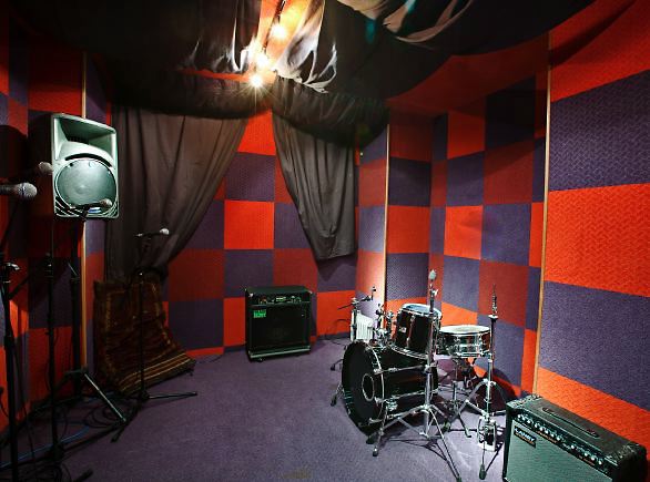 Very colourful, fun location with various rooms including a skate park, a recording studio and a games' room.