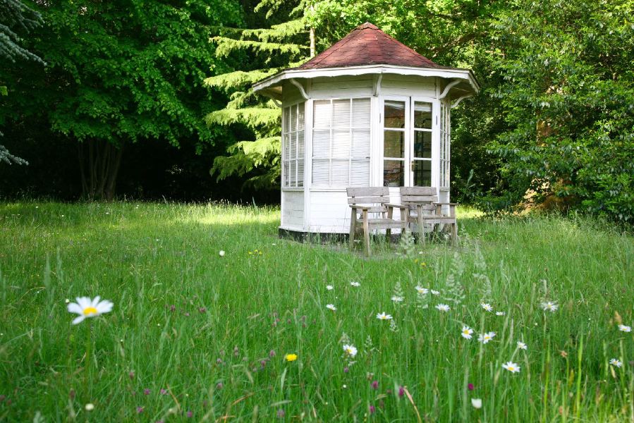 Lovely country house garden looking over a ha-ha at the surrounding countryside, within about 1 hour of Central London and easily accessible by the M4 or M40
