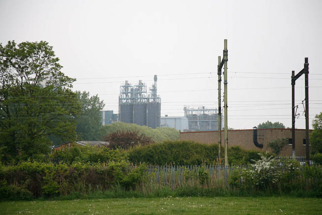 Football pitch on large recreation ground with great urban backdrop.