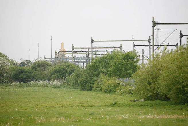 Football pitch on large recreation ground with great urban backdrop.