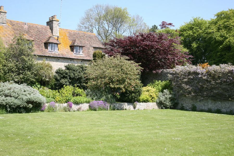 Stunning country house garden with views across the surrounding countryside