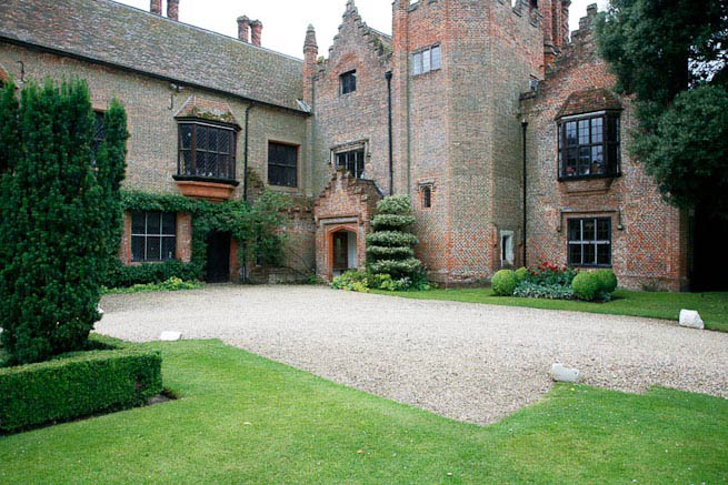 Driveways and entrance of a Tudor Manor house.