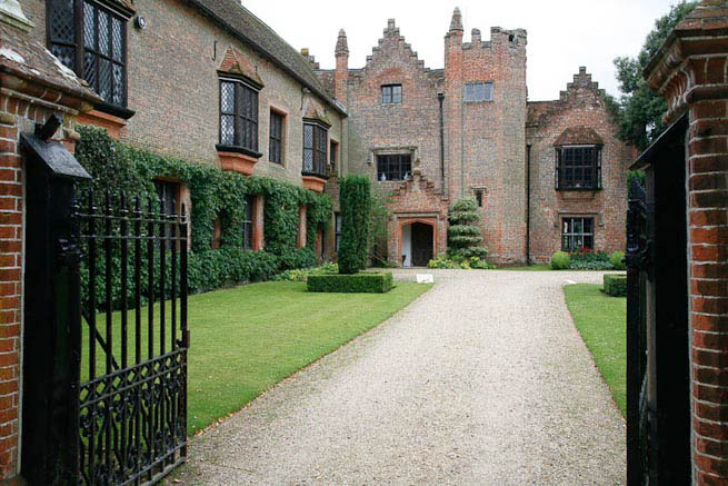 Driveways and entrance of a Tudor Manor house.
