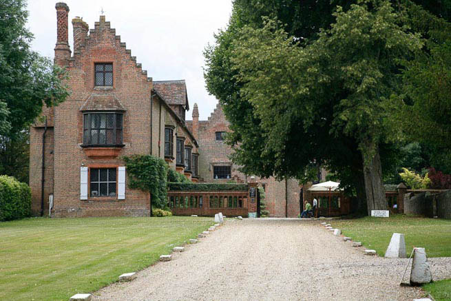 Driveways and entrance of a Tudor Manor house.