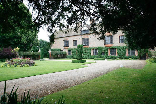Driveways and entrance of a Tudor Manor house.