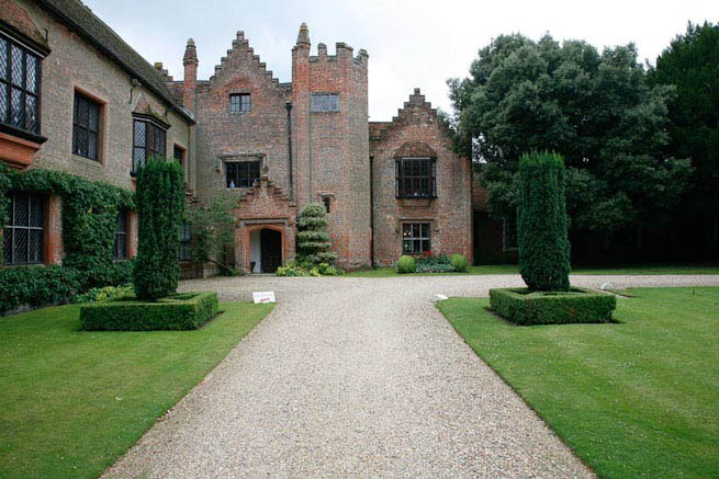Driveways and entrance of a Tudor Manor house.