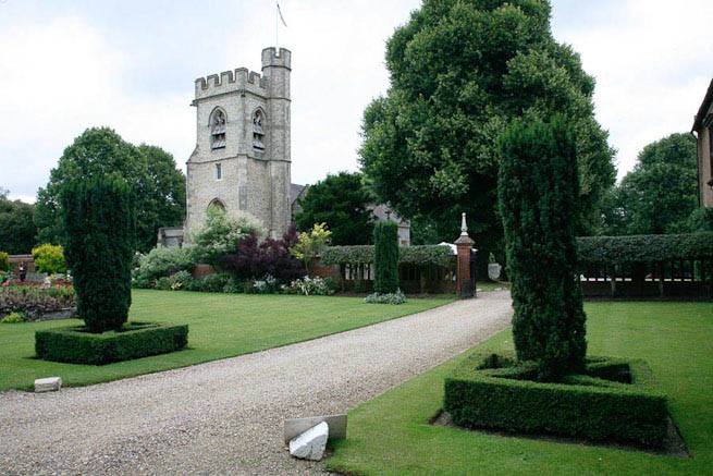 Driveways and entrance of a Tudor Manor house.