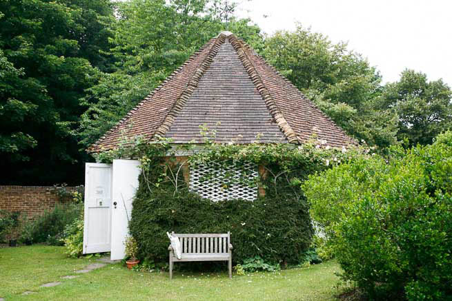 Gardens of a Tudor Manor house divided into compartments with different colour themes and structural forms.