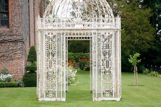 Gardens of a Tudor Manor house divided into compartments with different colour themes and structural forms.