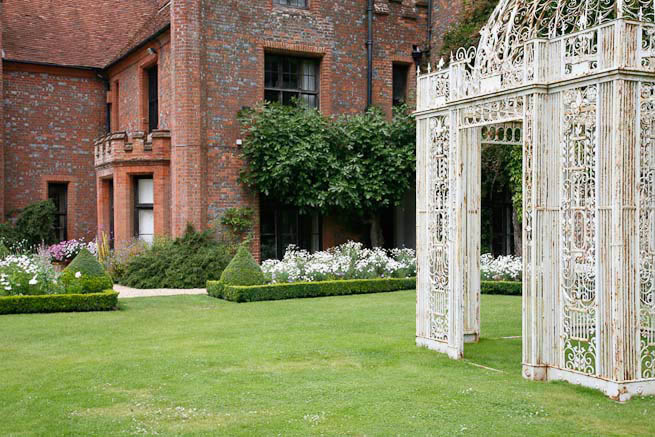 Gardens of a Tudor Manor house divided into compartments with different colour themes and structural forms.