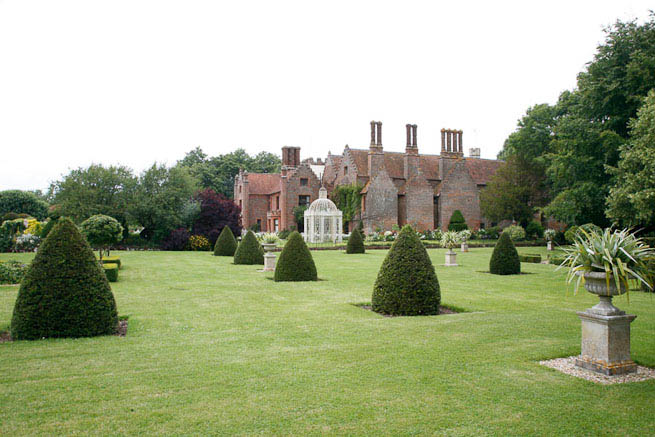Gardens of a Tudor Manor house divided into compartments with different colour themes and structural forms.