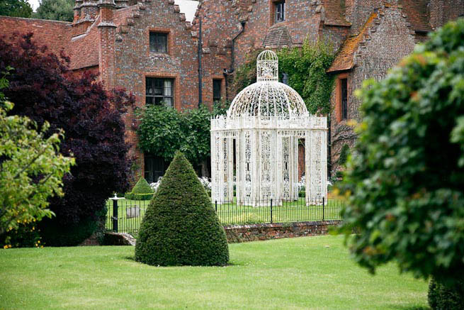Gardens of a Tudor Manor house divided into compartments with different colour themes and structural forms.