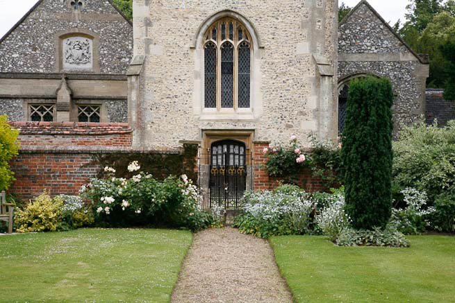 Gardens of a Tudor Manor house divided into compartments with different colour themes and structural forms.