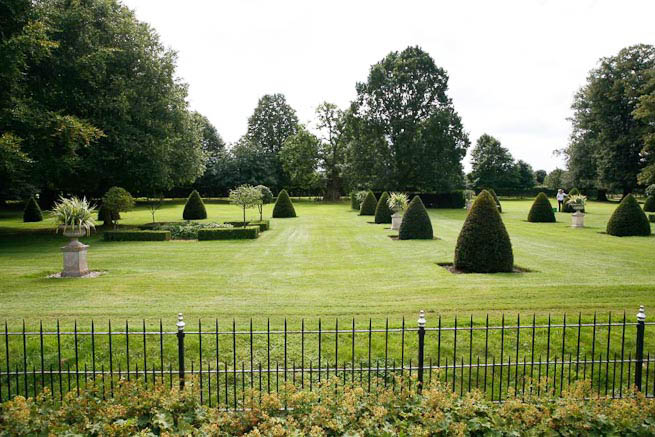 Gardens of a Tudor Manor house divided into compartments with different colour themes and structural forms.