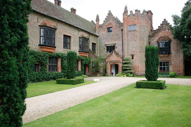 Gardens of a Tudor Manor house divided into compartments with different colour themes and structural forms.
