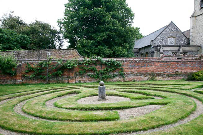 Gardens of a Tudor Manor house divided into compartments with different colour themes and structural forms.