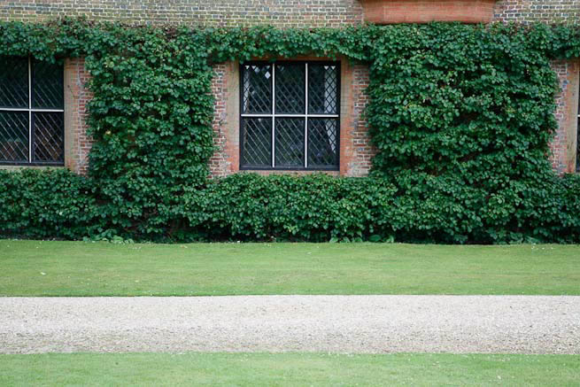Gardens of a Tudor Manor house divided into compartments with different colour themes and structural forms.