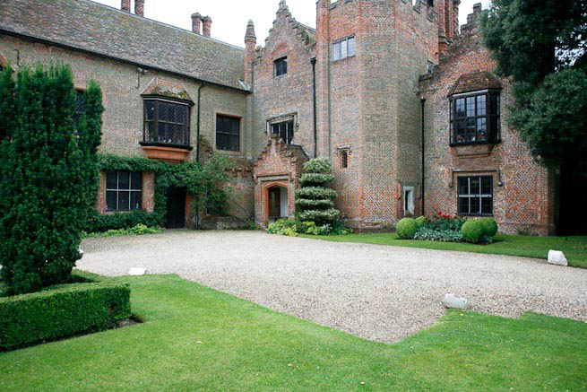 Gardens of a Tudor Manor house divided into compartments with different colour themes and structural forms.