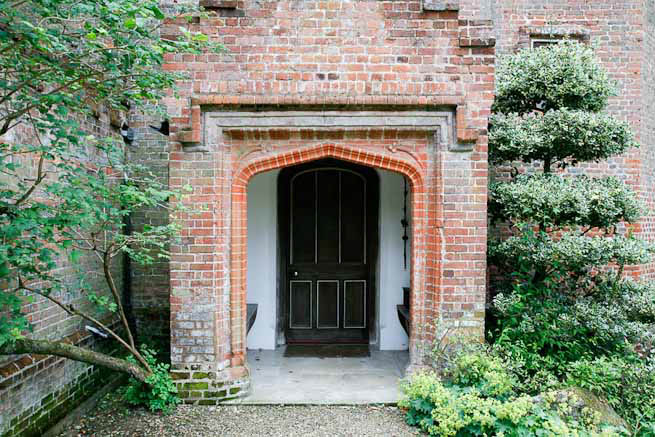 Gardens of a Tudor Manor house divided into compartments with different colour themes and structural forms.